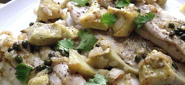 Τσιπούρα με αγκινάρες στο φούρνο